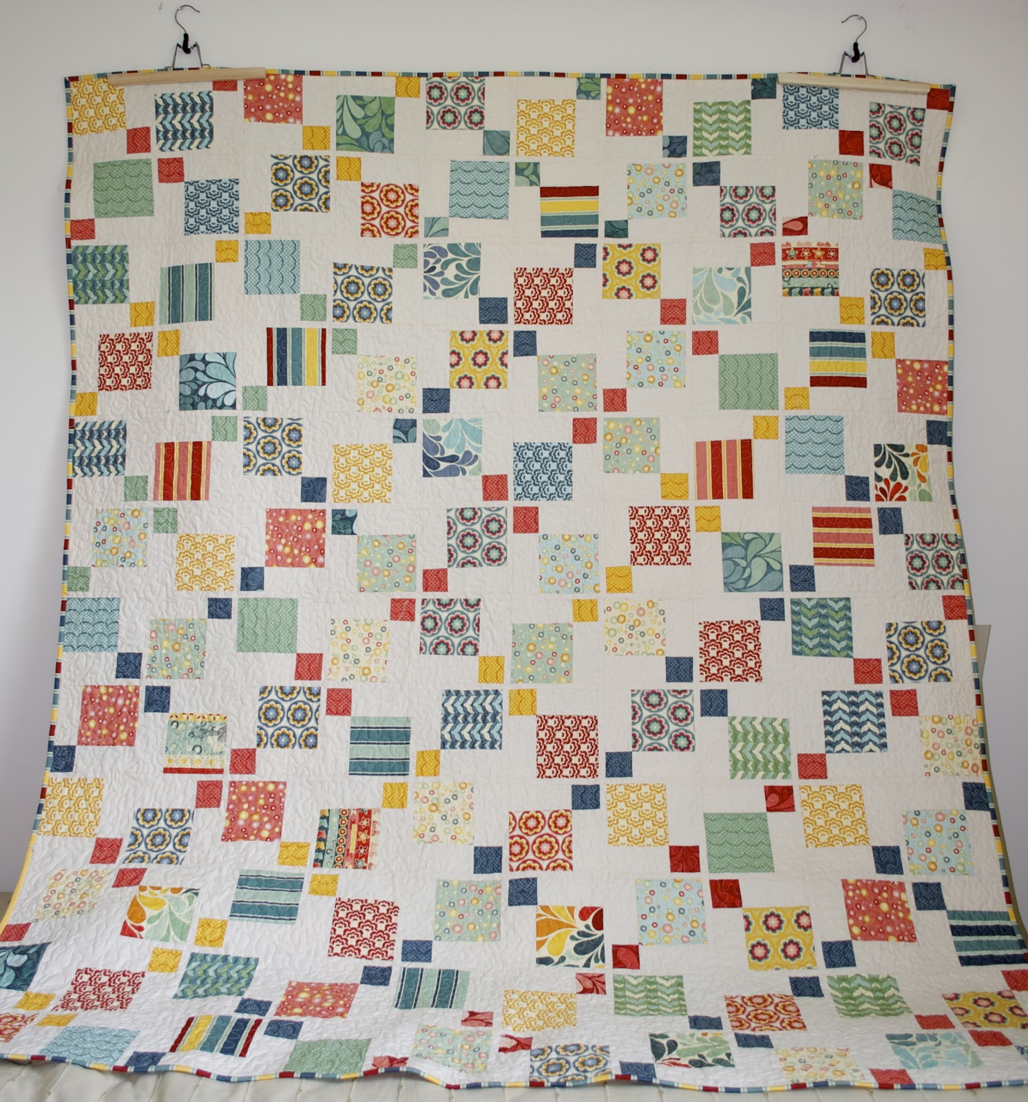 disappearing nine patch baby quilt